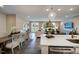 Spacious open-concept area combining kitchen, dining, and living room for modern living at 1033 Masters Place Way # 110, Durham, NC 27703