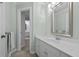 Well-lit bathroom with a white vanity and plenty of counter space at 105 Spring Bud Dr, Cary, NC 27513