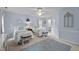 Bright bedroom with two twin beds, blue accents, and a ceiling fan at 105 Spring Bud Dr, Cary, NC 27513