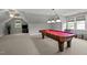 Large game room featuring a pool table, recessed lighting, and dormer windows at 105 Spring Bud Dr, Cary, NC 27513