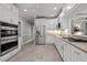 Spacious kitchen featuring stainless steel appliances and ample cabinet space at 105 Spring Bud Dr, Cary, NC 27513