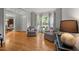 Sitting room with hardwood floors, light gray walls, and decorative bay window at 105 Spring Bud Dr, Cary, NC 27513
