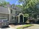 Charming two-story home with a traditional design, dormer windows, and a covered front porch at 110 Ruth St, Carrboro, NC 27510