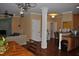 Open-concept space featuring hardwood floors, neutral paint, and seamless flow to dining area at 110 Ruth St, Carrboro, NC 27510