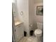 Clean and functional bathroom featuring a sink vanity and standard toilet at 11017 Peacock Moss St, Raleigh, NC 27613