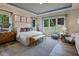 Spacious main bedroom with large windows, tray ceiling, and neutral decor at 1107 Masters Place Way # 155, Durham, NC 27703