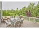 Multi-level deck boasts outdoor dining, lounging, and grilling areas, perfect for entertaining at 112 Filigree Way, Durham, NC 27713