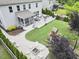Backyard with deck, fire pit, play area, and mature landscaping at 112 Filigree Way, Durham, NC 27713