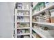 Pantry with white shelving, containers, and organized storage solutions at 112 Filigree Way, Durham, NC 27713