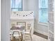 Charming play room with tent, table, and chairs next to windows with natural light at 112 Filigree Way, Durham, NC 27713
