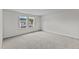 Bright, airy bedroom with plush carpet and natural light from two large windows at 1201 Solace Way, Rolesville, NC 27571
