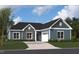 Charming single-story home with a combination of stone and siding exterior and a well-manicured front lawn at 1207 Masters Place Way # 184, Durham, NC 27703