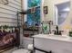 Bathroom featuring a vanity, mirror, and decorative shelves, with lots of natural light at 122 Button Rd, Morrisville, NC 27560