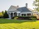 Well-maintained clubhouse with beautiful landscaping, manicured lawn, and architectural details at 122 Button Rd, Morrisville, NC 27560