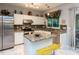 Modern kitchen with stainless steel appliances, granite countertops, and marble tile flooring at 122 Button Rd, Morrisville, NC 27560