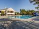 Large community pool with many chairs and a waterslide and clubhouse at the Breckenridge community at 122 Button Rd, Morrisville, NC 27560