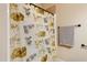 Bathroom with a shower and patterned shower curtain, along with a patterned towel at 13 Nettletree Creek Ct, Youngsville, NC 27596