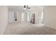 Bright, expansive bedroom with carpet, an open layout, and two doorways for convenience at 13121 Melvin Arnold Rd, Raleigh, NC 27613