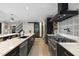 Modern kitchen features a large island, stainless steel appliances, and open layout at 13121 Melvin Arnold Rd, Raleigh, NC 27613