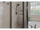 The large tiled shower in the bathroom has a bench at 1420 Heritage Links Dr, Wake Forest, NC 27587