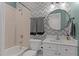 Full bathroom with tub and black and white patterned wall at 1420 Heritage Links Dr, Wake Forest, NC 27587