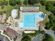 Aerial view of a community pool, surrounded by many lounge chairs at 1420 Heritage Links Dr, Wake Forest, NC 27587