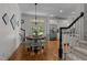 Charming dining area features hardwood floors, a stylish light fixture, and easy access to the kitchen at 1420 Heritage Links Dr, Wake Forest, NC 27587