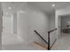 Upstairs hallway showing the staircase and doors to the rooms at 1420 Heritage Links Dr, Wake Forest, NC 27587
