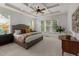 This primary bedroom features a trey ceiling and lots of natural light at 1420 Heritage Links Dr, Wake Forest, NC 27587
