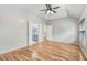 Primary bedroom boasts hardwood floors and an en-suite bathroom at 1480 Big Leaf Loop, Apex, NC 27502