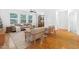 Inviting living room with hardwood floors, neutral decor, and plenty of natural light at 1480 Big Leaf Loop, Apex, NC 27502