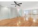 Open loft area boasts hardwood floors, natural light, and a convenient laundry room at 1480 Big Leaf Loop, Apex, NC 27502