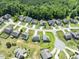 An aerial view of the neighborhood showcasing many houses with lush green lawns at 1499 Fireside Ln, Creedmoor, NC 27522