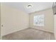 Neutral bedroom with a window with blinds and neutral carpet at 1499 Fireside Ln, Creedmoor, NC 27522