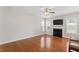Spacious living room with fireplace and abundant natural light from large, bright windows at 1499 Fireside Ln, Creedmoor, NC 27522