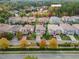Aerial view of neighborhood featuring mature trees and landscaping at 15 Treviso Pl, Durham, NC 27707