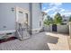 Backyard patio area with stone pavers and wrought iron railing fence at 15 Treviso Pl, Durham, NC 27707