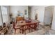 Cozy dining room features wood floors, a classic rug, and a traditional dining table at 153 Bywood Dr, Roxboro, NC 27573