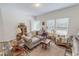 Inviting living room filled with neutral-toned furniture and natural light from the front windows at 153 Bywood Dr, Roxboro, NC 27573