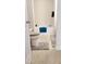 Bathroom with a tub and shower combination, neutral tile flooring, and updated fixtures at 1633 Snow Mass Way, Durham, NC 27713