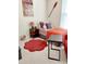 Comfortable bedroom with stylish décor, a twin bed, and a vintage fan at 1633 Snow Mass Way, Durham, NC 27713