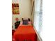 Bright bedroom with a twin bed, modern art, and natural light from a window at 1633 Snow Mass Way, Durham, NC 27713