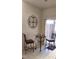 Cozy breakfast nook with a glass-top table and seating, bathed in natural light from a nearby window at 1633 Snow Mass Way, Durham, NC 27713