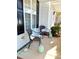 Cozy front porch area with seating and charming decorations, perfect for relaxing outdoors at 1633 Snow Mass Way, Durham, NC 27713