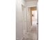 Neutral hallway with multiple doorways leading to different rooms in the house at 1633 Snow Mass Way, Durham, NC 27713