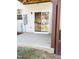 Back patio featuring a sliding glass door, a concrete slab, and backyard views at 1633 Snow Mass Way, Durham, NC 27713
