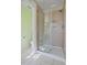 Modern bathroom features a tiled shower with glass door and bright lighting at 169 Clearwater Harbor Hbr, Sanford, NC 27332