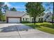 Charming single-story home with manicured lawn, long drive and attached two car garage at 169 Clearwater Harbor Hbr, Sanford, NC 27332