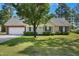 Charming single-story home with manicured lawn, inviting entrance and attached two car garage at 169 Clearwater Harbor Hbr, Sanford, NC 27332
