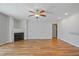 Open-concept living room with wood floors and fireplace at 169 Clearwater Harbor Hbr, Sanford, NC 27332